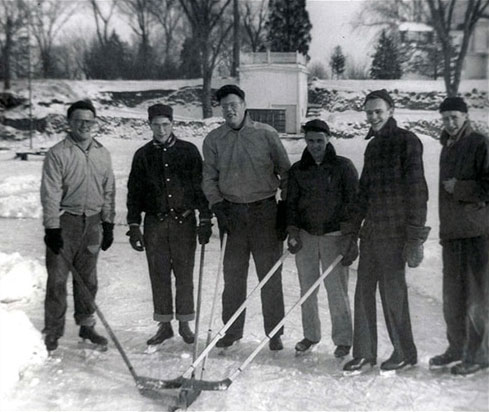 San Damiano residents enjoying a game of hockey on Lake Monona.